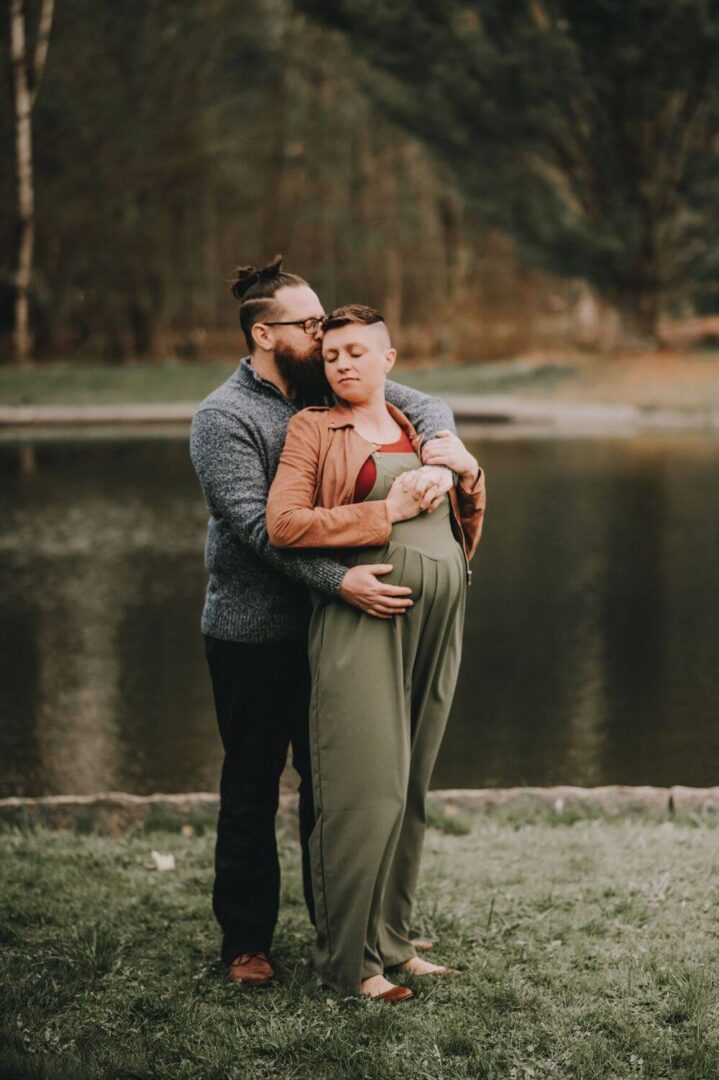 A man and woman standing next to each other.